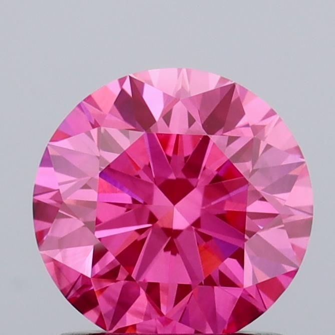 Ideal Loose Diamond - ROUND 1.01ct Fancy Vivid Pink SI1: Ideal Loose Diamond - ROUND 1.01ct Fancy Vivid Pink SI1 Source: This is a real non-mined Diamond that has been grown in a lab Shape: ROUND Carats: 1.01 Color: Fancy Vivid Pink Certification: IGI Video