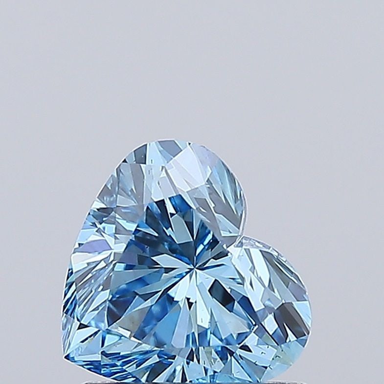 Loose Diamond - HEART 1.06ct Fancy Vivid Blue VS1: Loose Diamond - HEART 1.06ct Fancy Vivid Blue VS1 Source: This is a real non-mined Diamond that has been grown in a lab Shape: HEART Carats: 1.06 Color: Fancy Vivid Blue Certification: IGI Video: