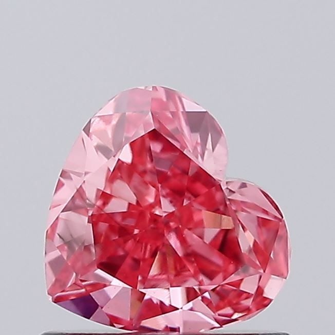Loose Diamond - HEART 0.74ct Fancy Vivid Pink VS2: Loose Diamond - HEART 0.74ct Fancy Vivid Pink VS2 Source: This is a real non-mined Diamond that has been grown in a lab Shape: HEART Carats: 0.74 Color: Fancy Vivid Pink Certification: IGI Video: