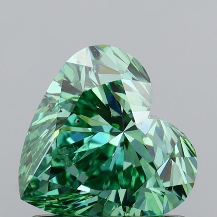 Loose Diamond - HEART 1.0ct Fancy Vivid Green SI1: Loose Diamond - HEART 1.0ct Fancy Vivid Green SI1 Source: This is a real non-mined Diamond that has been grown in a lab Shape: HEART Carats: 1.0 Color: Fancy Vivid Green Certification: IGI Video: