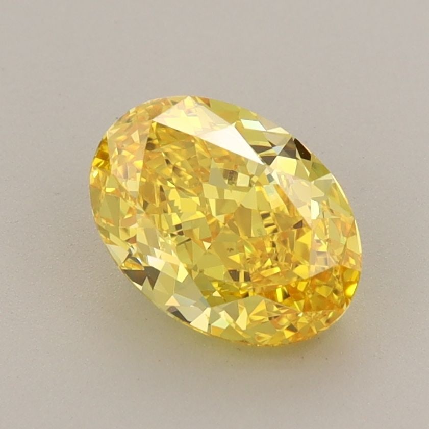 Loose Diamond - OVAL 1.53ct Fancy Vivid Yellow VS1: Loose Diamond - OVAL 1.53ct Fancy Vivid Yellow VS1 Source: This is a real non-mined Diamond that has been grown in a lab Shape: OVAL Carats: 1.53 Color: Fancy Vivid Yellow Certification: IGI Video: