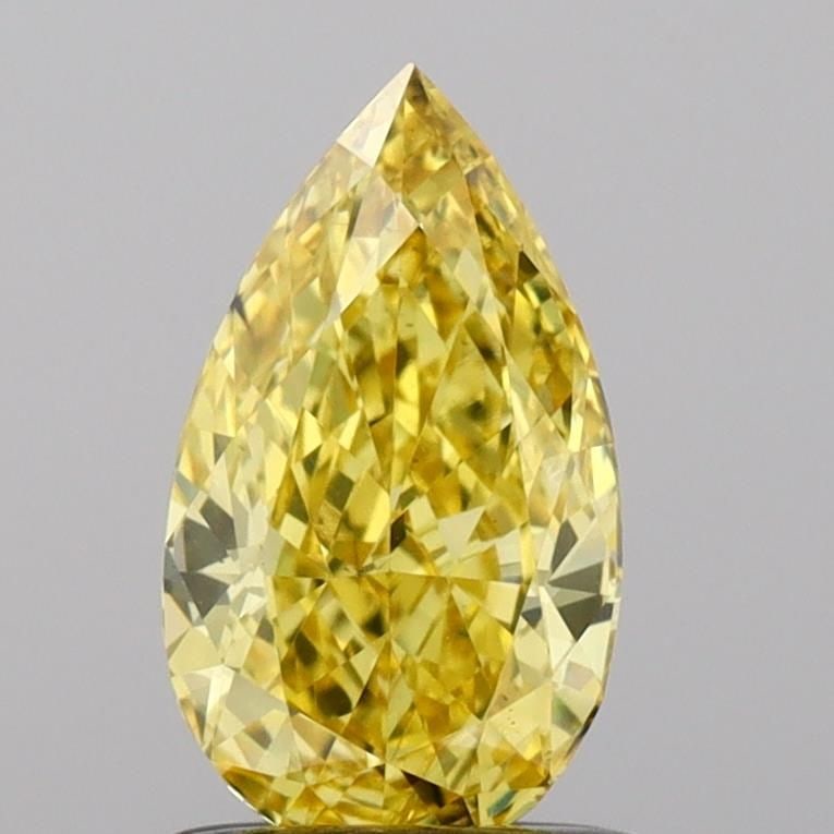 Loose Diamond - PEAR 0.92ct Fancy Vivid Yellow VS2: Loose Diamond - PEAR 0.92ct Fancy Vivid Yellow VS2 Source: This is a real non-mined Diamond that has been grown in a lab Shape: PEAR Carats: 0.92 Color: Fancy Vivid Yellow Certification: IGI Video: