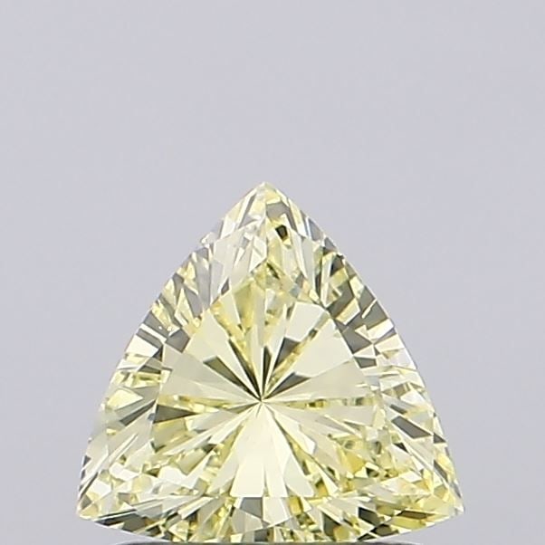 Loose Diamond - TRIANGULAR 0.7ct Fancy Yellow VVS2: Loose Diamond - TRIANGULAR 0.7ct Fancy Yellow VVS2 Source: This is a real non-mined Diamond that has been grown in a lab Shape: TRIANGULAR Carats: 0.7 Color: Fancy Yellow Certification: IGI Video: