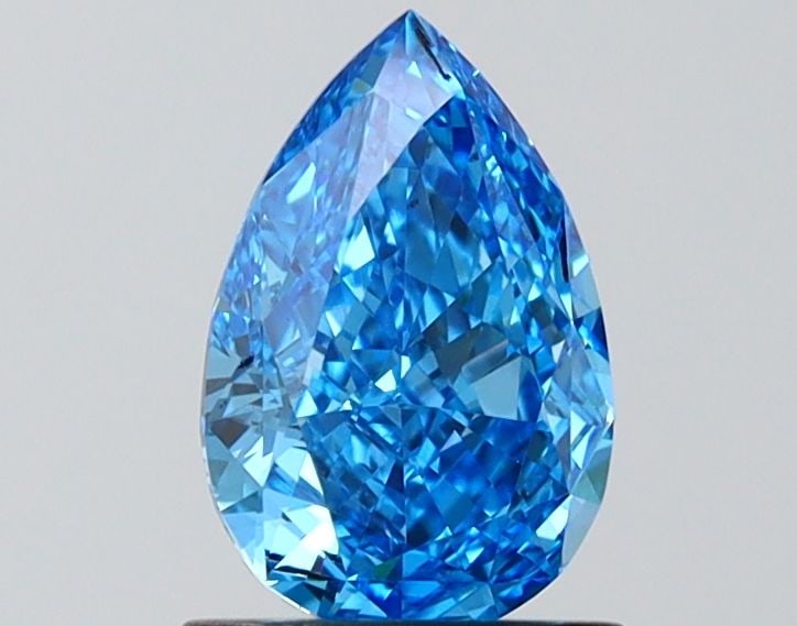 Loose Diamond - PEAR 1.1ct Fancy Vivid Blue VVS1: Loose Diamond - PEAR 1.1ct Fancy Vivid Blue VVS1 Source: This is a real non-mined Diamond that has been grown in a lab Shape: PEAR Carats: 1.1 Color: Fancy Vivid Blue Certification: IGI Video: