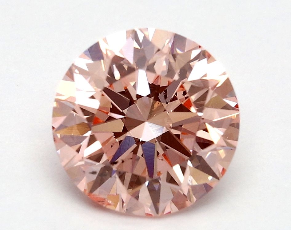 Loose Diamond - ROUND 1.58ct Fancy Vivid Pink SI1: Loose Diamond - ROUND 1.58ct Fancy Vivid Pink SI1 Source: This is a real non-mined Diamond that has been grown in a lab Shape: ROUND Carats: 1.58 Color: Fancy Vivid Pink Certification: IGI Video: