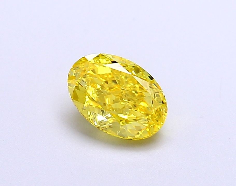 Loose Diamond - OVAL 1.0ct Fancy Vivid Yellow VS1: Loose Diamond - OVAL 1.0ct Fancy Vivid Yellow VS1 Source: This is a real non-mined Diamond that has been grown in a lab Shape: OVAL Carats: 1.0 Color: Fancy Vivid Yellow Certification: IGI Video:
