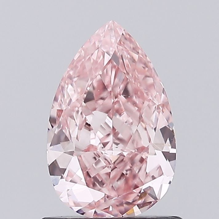 Loose Diamond - PEAR 0.99ct Fancy Vivid Pink VS1: Loose Diamond - PEAR 0.99ct Fancy Vivid Pink VS1 Source: This is a real non-mined Diamond that has been grown in a lab Shape: PEAR Carats: 0.99 Color: Fancy Vivid Pink Certification: IGI Video: