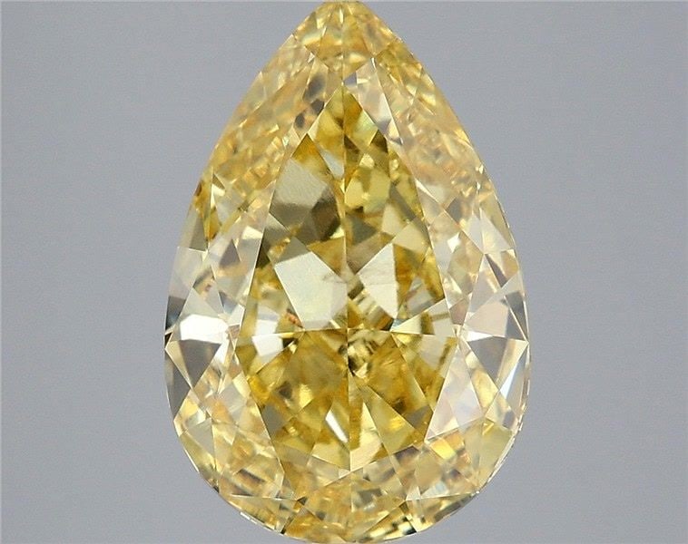 Loose Diamond - PEAR 5.03ct Fancy Vivid Yellow VS1: Loose Diamond - PEAR 5.03ct Fancy Vivid Yellow VS1 Source: This is a real non-mined Diamond that has been grown in a lab Shape: PEAR Carats: 5.03 Color: Fancy Vivid Yellow Certification: IGI Video: