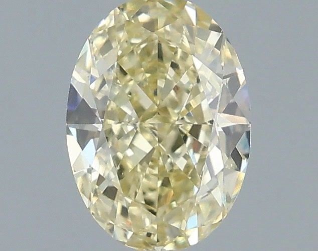 Loose Diamond - OVAL 1.06ct Fancy Light Yellow VS1: Loose Diamond - OVAL 1.06ct Fancy Light Yellow VS1 Source: This is a real non-mined Diamond that has been grown in a lab Shape: OVAL Carats: 1.06 Color: Fancy Light Yellow Certification: IGI Video: