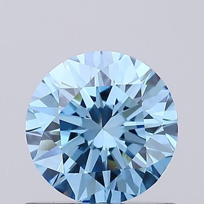 Loose Diamond - ROUND 0.78ct Fancy Vivid Blue VS1: Loose Diamond - ROUND 0.78ct Fancy Vivid Blue VS1 Source: This is a real non-mined Diamond that has been grown in a lab Shape: ROUND Carats: 0.78 Color: Fancy Vivid Blue Certification: IGI Video: