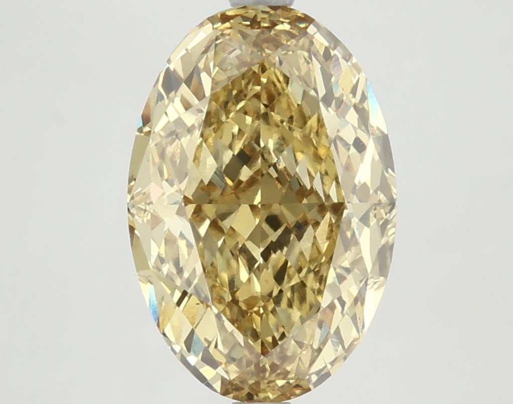 Loose Diamond - OVAL 5.09ct Fancy Vivid Yellow VS2: Loose Diamond - OVAL 5.09ct Fancy Vivid Yellow VS2 Source: This is a real non-mined Diamond that has been grown in a lab Shape: OVAL Carats: 5.09 Color: Fancy Vivid Yellow Certification: NONE Addition