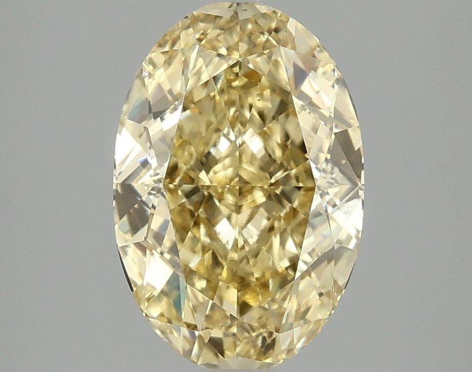 Loose Diamond - OVAL 3.09ct Fancy Intense Yellow VS1: Loose Diamond - OVAL 3.09ct Fancy Intense Yellow VS1 Source: This is a real non-mined Diamond that has been grown in a lab Shape: OVAL Carats: 3.09 Color: Fancy Intense Yellow Certification: IGI Video