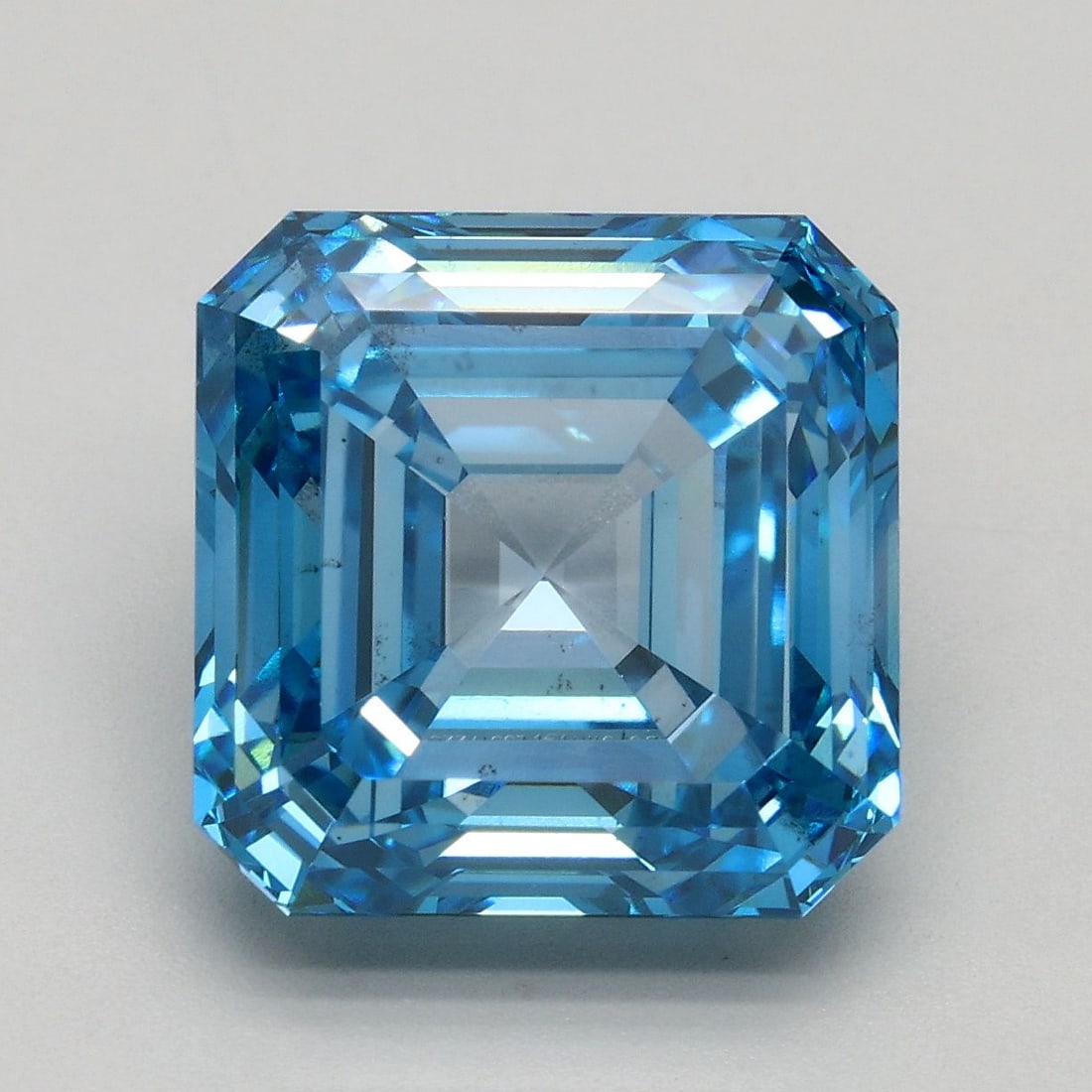 Loose Diamond - ASSCHER 5.18ct Fancy Vivid Blue VS2: Loose Diamond - ASSCHER 5.18ct Fancy Vivid Blue VS2 Source: This is a real non-mined Diamond that has been grown in a lab Shape: ASSCHER Carats: 5.18 Color: Fancy Vivid Blue Certification: IGI Video: