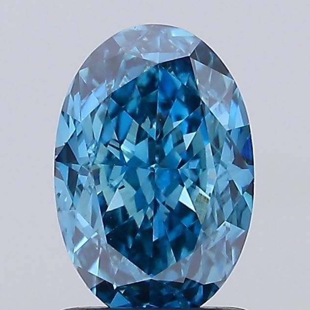 Loose Diamond - OVAL 1.59ct Fancy Vivid Blue VVS2: Loose Diamond - OVAL 1.59ct Fancy Vivid Blue VVS2 Source: This is a real non-mined Diamond that has been grown in a lab Shape: OVAL Carats: 1.59 Color: Fancy Vivid Blue Certification: IGI Additional i
