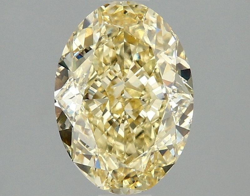 Loose Diamond - OVAL 2.1ct Fancy Intense Yellow VS1: Loose Diamond - OVAL 2.1ct Fancy Intense Yellow VS1 Source: This is a real non-mined Diamond that has been grown in a lab Shape: OVAL Carats: 2.1 Color: Fancy Intense Yellow Certification: IGI Video: