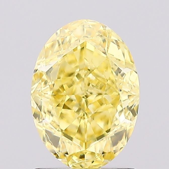 Loose Diamond - OVAL 1.36ct Fancy Vivid Yellow SI1: Loose Diamond - OVAL 1.36ct Fancy Vivid Yellow SI1 Source: This is a real non-mined Diamond that has been grown in a lab Shape: OVAL Carats: 1.36 Color: Fancy Vivid Yellow Certification: IGI Video: