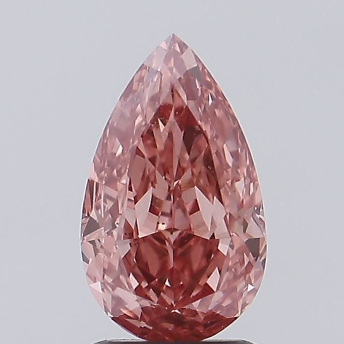 Loose Diamond - PEAR 1.35ct Fancy Vivid Pink VVS2: Loose Diamond - PEAR 1.35ct Fancy Vivid Pink VVS2 Source: This is a real non-mined Diamond that has been grown in a lab Shape: PEAR Carats: 1.35 Color: Fancy Vivid Pink Certification: IGI Video: