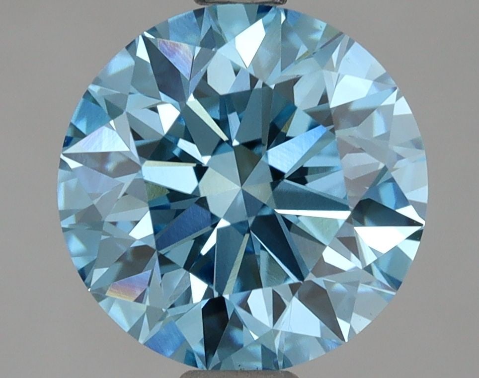 Loose Diamond - ROUND 2.57ct Fancy Vivid Blue VS1: Loose Diamond - ROUND 2.57ct Fancy Vivid Blue VS1 Source: This is a real non-mined Diamond that has been grown in a lab Shape: ROUND Carats: 2.57 Color: Fancy Vivid Blue Certification: IGI Video: