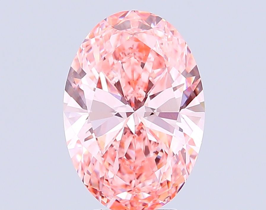 Loose Diamond - OVAL 6.01ct Fancy Vivid Pink VVS2: Loose Diamond - OVAL 6.01ct Fancy Vivid Pink VVS2 Source: This is a real non-mined Diamond that has been grown in a lab Shape: OVAL Carats: 6.01 Color: Fancy Vivid Pink Certification: IGI Video: