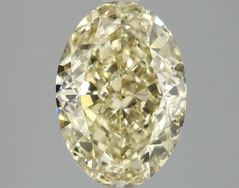 Loose Diamond - OVAL 3.06ct Fancy Vivid Yellow VS1: Loose Diamond - OVAL 3.06ct Fancy Vivid Yellow VS1 Source: This is a real non-mined Diamond that has been grown in a lab Shape: OVAL Carats: 3.06 Color: Fancy Vivid Yellow Certification: IGI Video: