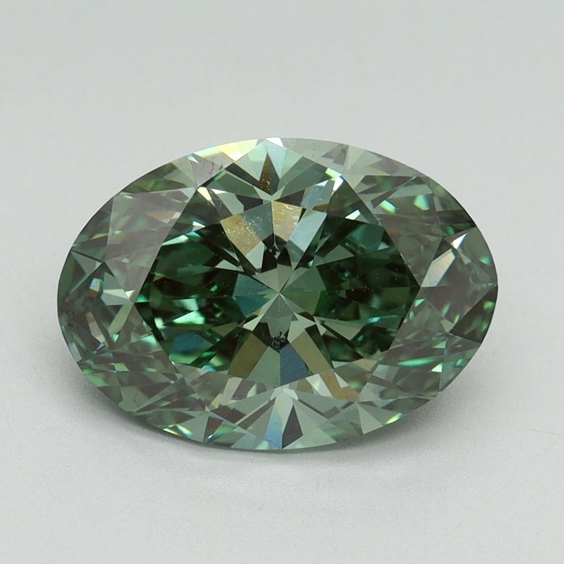 Loose Diamond - OVAL 3.09ct Fancy Vivid Green VS1: Loose Diamond - OVAL 3.09ct Fancy Vivid Green VS1 Source: This is a real non-mined Diamond that has been grown in a lab Shape: OVAL Carats: 3.09 Color: Fancy Vivid Green Certification: IGI Video: