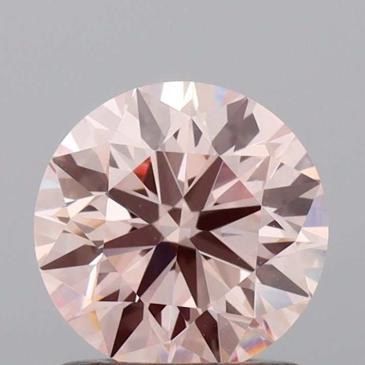 Ideal Loose Diamond - ROUND 1.05ct Fancy Pink VVS2: Ideal Loose Diamond - ROUND 1.05ct Fancy Pink VVS2 Source: This is a real non-mined Diamond that has been grown in a lab Shape: ROUND Carats: 1.05 Color: Fancy Pink Certification: IGI Video: