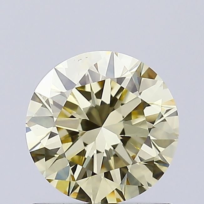 Loose Diamond - ROUND 0.77ct Fancy Light Yellow VS1: Loose Diamond - ROUND 0.77ct Fancy Light Yellow VS1 Source: This is a real non-mined Diamond that has been grown in a lab Shape: ROUND Carats: 0.77 Color: Fancy Light Yellow Certification: IGI Video: