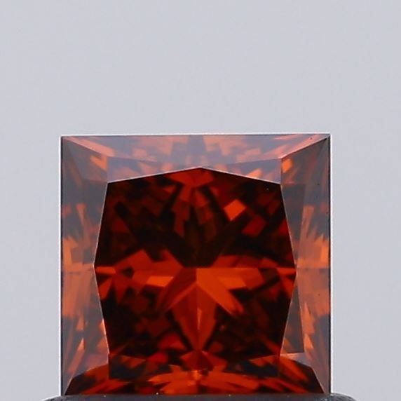 Loose Diamond - PRINCESS 0.6ct Fancy Vivid Orange VVS2: Loose Diamond - PRINCESS 0.6ct Fancy Vivid Orange VVS2 Source: This is a real non-mined Diamond that has been grown in a lab Shape: PRINCESS Carats: 0.6 Color: Fancy Vivid Orange Certification: IGI