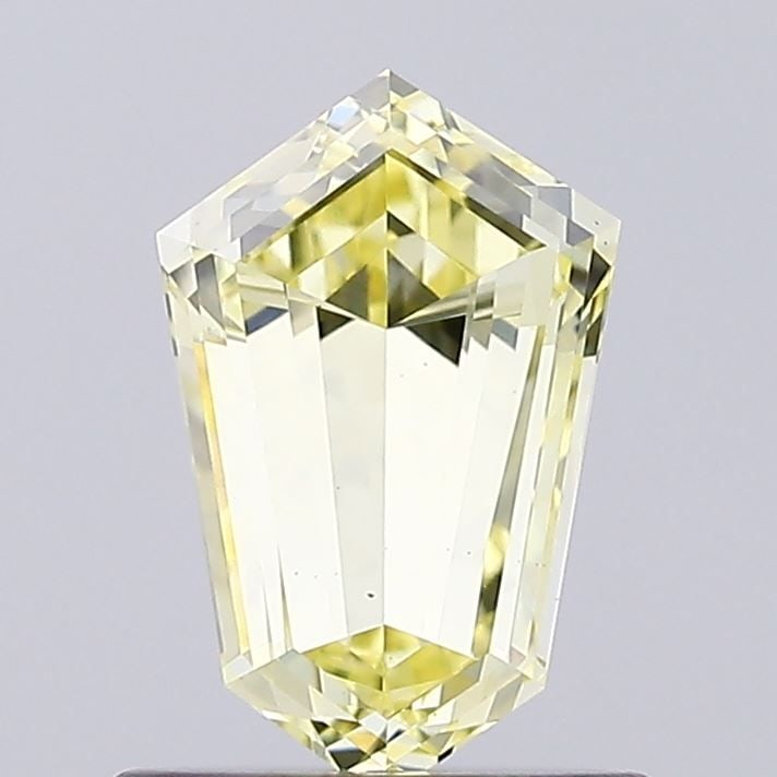 Loose Diamond - SHIELD 1.0ct Fancy Yellow VS1: Loose Diamond - SHIELD 1.0ct Fancy Yellow VS1 Source: This is a real non-mined Diamond that has been grown in a lab Shape: SHIELD Carats: 1.0 Color: Fancy Yellow Certification: IGI Video: