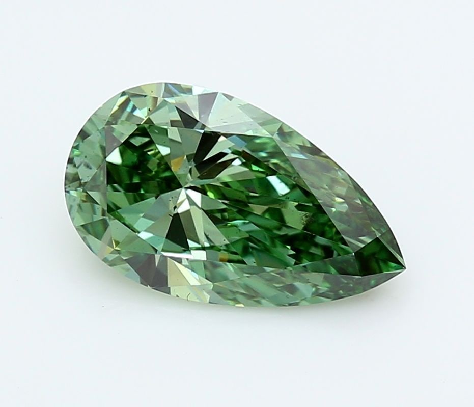 Loose Diamond - PEAR 2.84ct Fancy Vivid Green SI1: Loose Diamond - PEAR 2.84ct Fancy Vivid Green SI1 Source: This is a real non-mined Diamond that has been grown in a lab Shape: PEAR Carats: 2.84 Color: Fancy Vivid Green Certification: IGI Video: