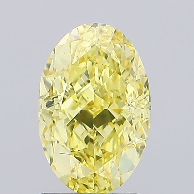 Loose Diamond - OVAL 2.07ct Fancy Vivid Yellow VS2: Loose Diamond - OVAL 2.07ct Fancy Vivid Yellow VS2 Source: This is a real non-mined Diamond that has been grown in a lab Shape: OVAL Carats: 2.07 Color: Fancy Vivid Yellow Certification: IGI Video: