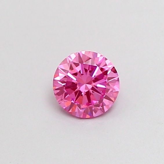 Loose Diamond - ROUND 0.32ct Fancy Vivid Pink VS2: Loose Diamond - ROUND 0.32ct Fancy Vivid Pink VS2 Source: This is a real non-mined Diamond that has been grown in a lab Shape: ROUND Carats: 0.32 Color: Fancy Vivid Pink Certification: IGI Video: