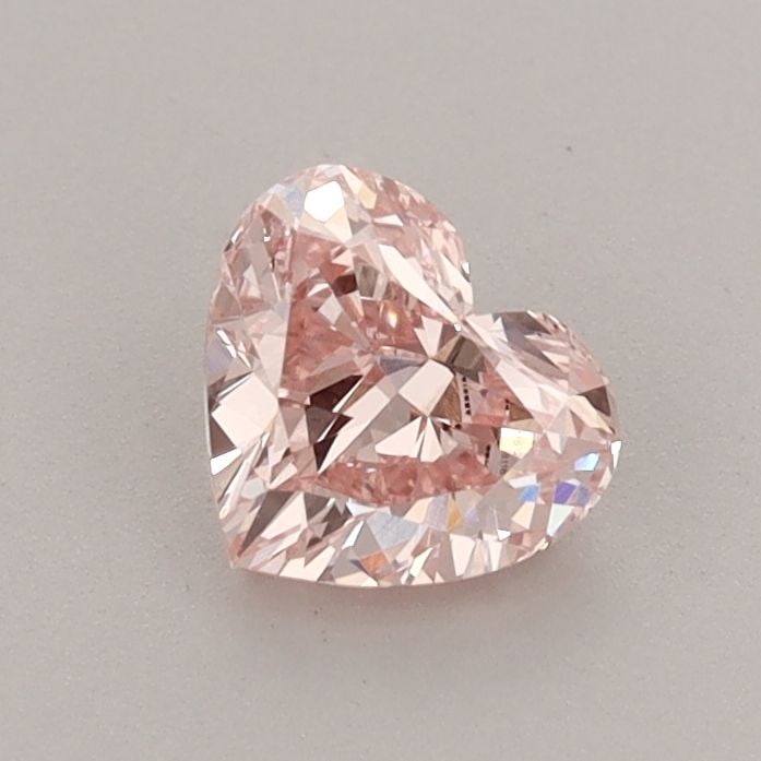 Loose Diamond - HEART 0.68ct Fancy Intense Pink VVS2: Loose Diamond - HEART 0.68ct Fancy Intense Pink VVS2 Source: This is a real non-mined Diamond that has been grown in a lab Shape: HEART Carats: 0.68 Color: Fancy Intense Pink Certification: IGI Video: