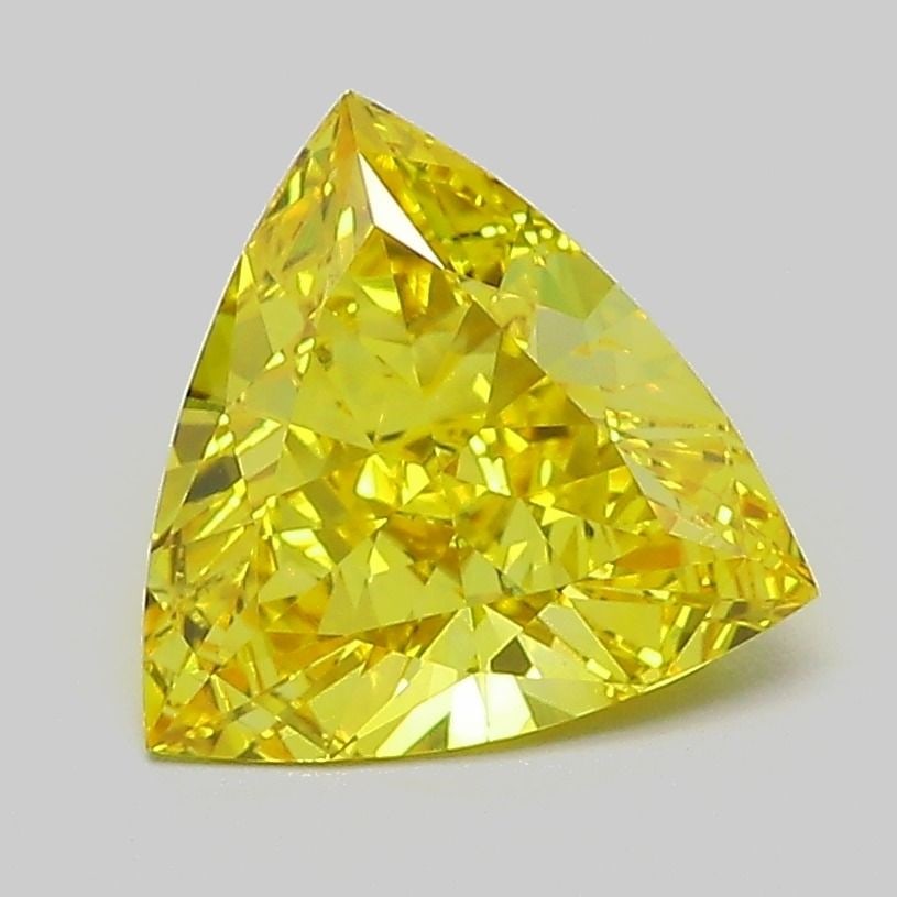 Loose Diamond - TRIANGULAR 1.4ct Fancy Vivid Yellow VVS2: Loose Diamond - TRIANGULAR 1.4ct Fancy Vivid Yellow VVS2 Source: This is a real non-mined Diamond that has been grown in a lab Shape: TRIANGULAR Carats: 1.4 Color: Fancy Vivid Yellow Certification: IG