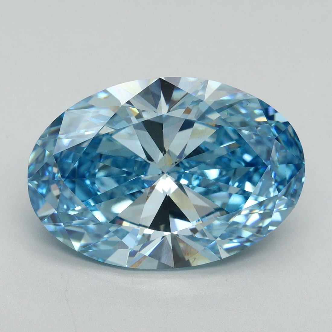 Loose Diamond - OVAL 7.59ct Fancy Vivid Blue VS1: Loose Diamond - OVAL 7.59ct Fancy Vivid Blue VS1 Source: This is a real non-mined Diamond that has been grown in a lab Shape: OVAL Carats: 7.59 Color: Fancy Vivid Blue Certification: IGI Video: