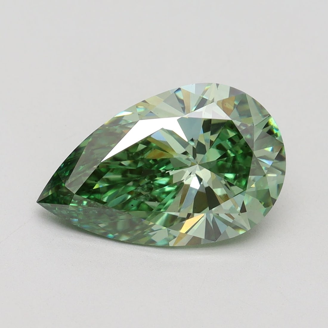 Loose Diamond - PEAR 3.61ct Fancy Vivid Green VS1: Loose Diamond - PEAR 3.61ct Fancy Vivid Green VS1 Source: This is a real non-mined Diamond that has been grown in a lab Shape: PEAR Carats: 3.61 Color: Fancy Vivid Green Certification: IGI Video: