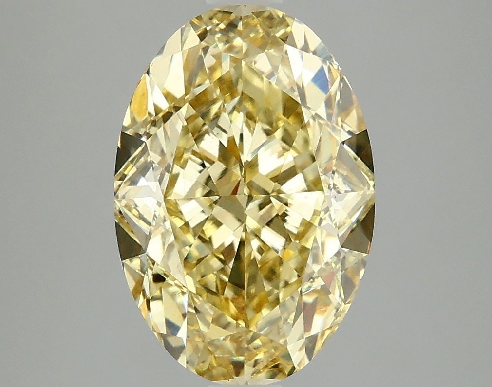 Loose Diamond - OVAL 4.05ct Fancy Vivid Yellow VS1: Loose Diamond - OVAL 4.05ct Fancy Vivid Yellow VS1 Source: This is a real non-mined Diamond that has been grown in a lab Shape: OVAL Carats: 4.05 Color: Fancy Vivid Yellow Certification: IGI Video: