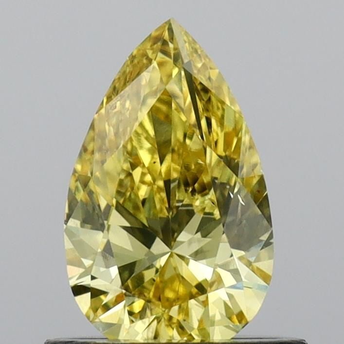 Loose Diamond - PEAR 0.68ct Fancy Vivid Yellow VS2: Loose Diamond - PEAR 0.68ct Fancy Vivid Yellow VS2 Source: This is a real non-mined Diamond that has been grown in a lab Shape: PEAR Carats: 0.68 Color: Fancy Vivid Yellow Certification: IGI Video: