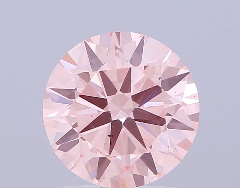 Loose Diamond - ROUND 2.26ct Fancy Vivid Pink VS2: Loose Diamond - ROUND 2.26ct Fancy Vivid Pink VS2 Source: This is a real non-mined Diamond that has been grown in a lab Shape: ROUND Carats: 2.26 Color: Fancy Vivid Pink Certification: NONE Video: