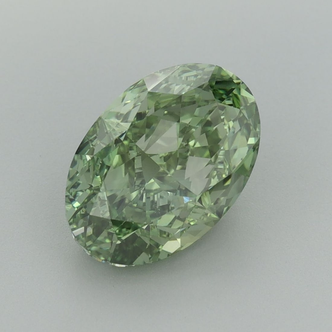 Loose Diamond - OVAL 3.02ct Fancy Vivid Green VVS2: Loose Diamond - OVAL 3.02ct Fancy Vivid Green VVS2 Source: This is a real non-mined Diamond that has been grown in a lab Shape: OVAL Carats: 3.02 Color: Fancy Vivid Green Certification: IGI Additional