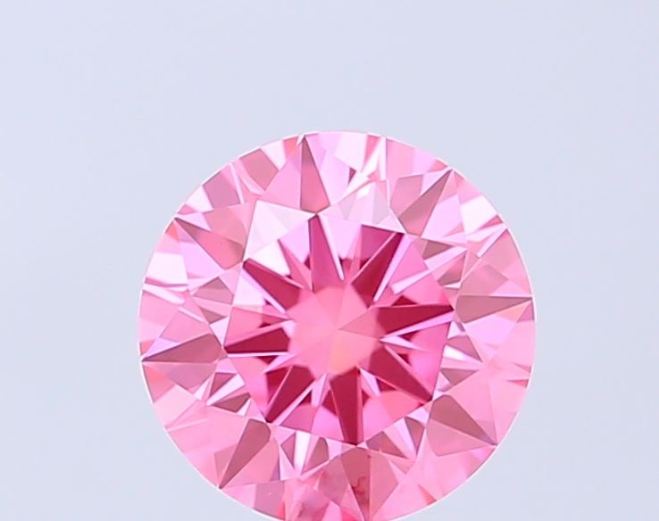 Ideal Loose Diamond - ROUND 1.07ct Fancy Vivid Pink VVS1: Ideal Loose Diamond - ROUND 1.07ct Fancy Vivid Pink VVS1 Source: This is a real non-mined Diamond that has been grown in a lab Shape: ROUND Carats: 1.07 Color: Fancy Vivid Pink Certification: IGI Vide