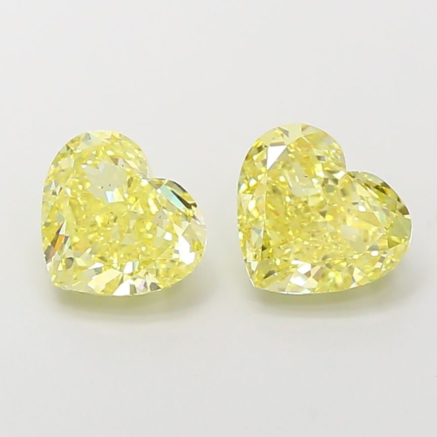 Loose Diamond - HEART 2.0ct Fancy Yellow VS2: Loose Diamond - HEART 2.0ct Fancy Yellow VS2 Source: This is a real non-mined Diamond that has been grown in a lab Shape: HEART Carats: 2.0 Color: Fancy Yellow Certification: IGI Video: