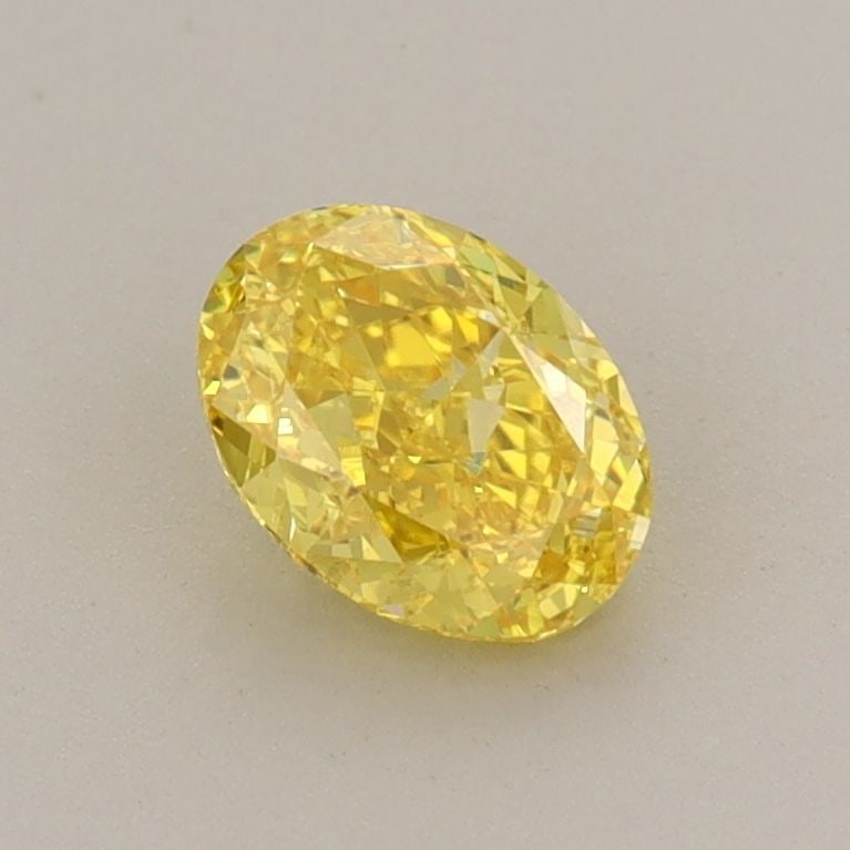 Loose Diamond - OVAL 0.72ct Fancy Vivid Yellow VS1: Loose Diamond - OVAL 0.72ct Fancy Vivid Yellow VS1 Source: This is a real non-mined Diamond that has been grown in a lab Shape: OVAL Carats: 0.72 Color: Fancy Vivid Yellow Certification: IGI Additiona