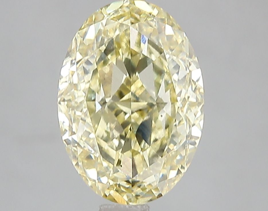 Loose Diamond - OVAL 3.06ct Fancy Intense Yellow VS2: Loose Diamond - OVAL 3.06ct Fancy Intense Yellow VS2 Source: This is a real non-mined Diamond that has been grown in a lab Shape: OVAL Carats: 3.06 Color: Fancy Intense Yellow Certification: IGI Video