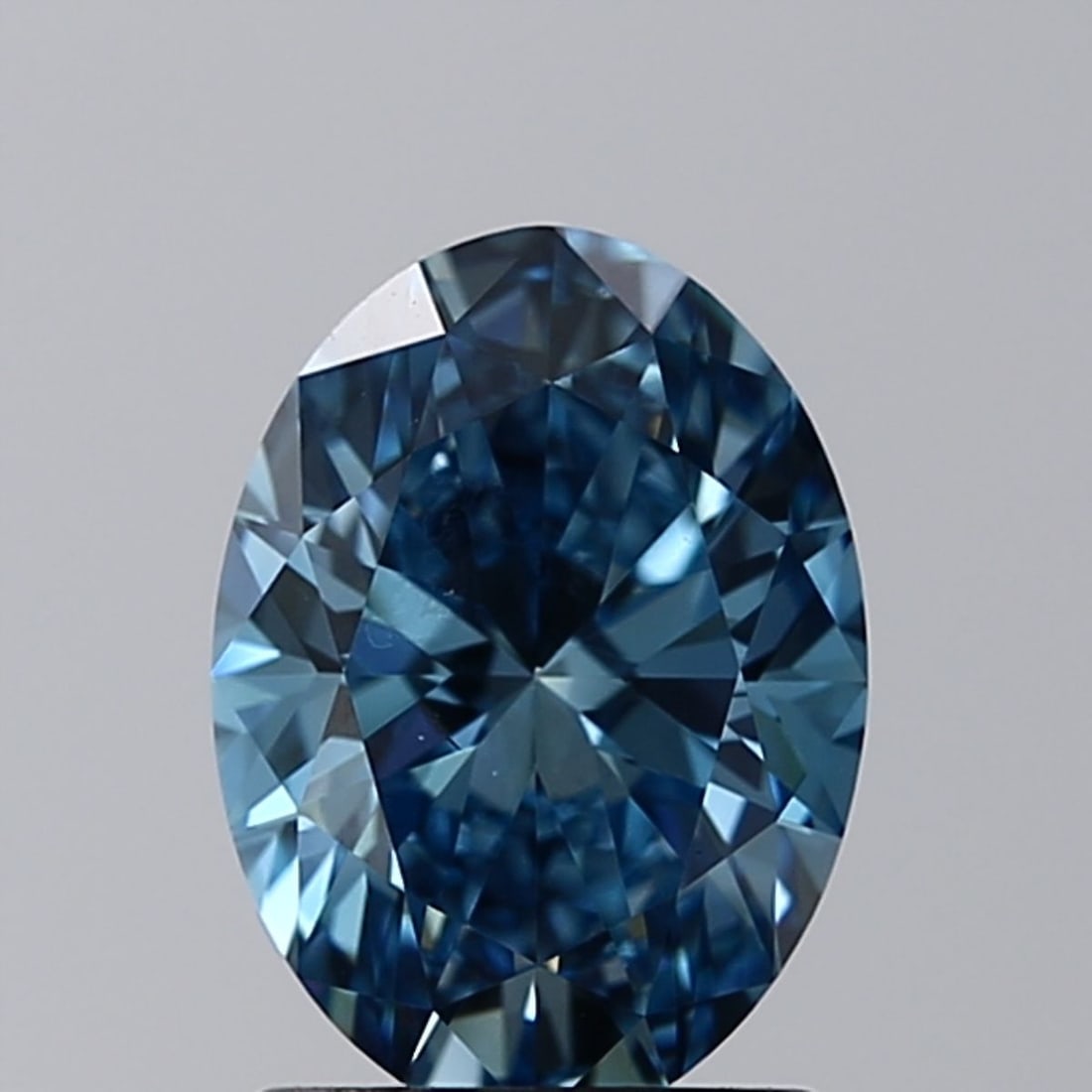 Loose Diamond - OVAL 1.41ct Fancy Vivid Blue VS2: Loose Diamond - OVAL 1.41ct Fancy Vivid Blue VS2 Source: This is a real non-mined Diamond that has been grown in a lab Shape: OVAL Carats: 1.41 Color: Fancy Vivid Blue Certification: IGI Video: