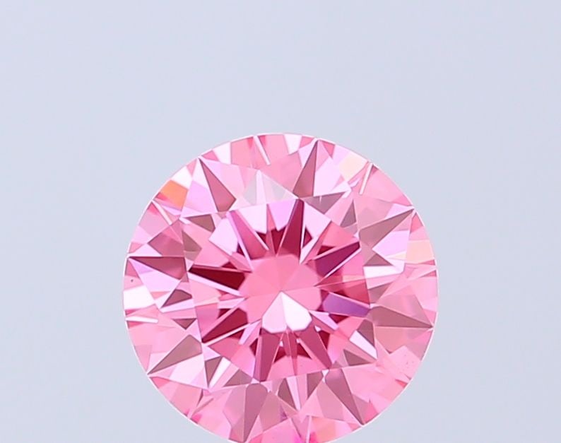Ideal Loose Diamond - ROUND 1.09ct Fancy Vivid Pink VVS2: Ideal Loose Diamond - ROUND 1.09ct Fancy Vivid Pink VVS2 Source: This is a real non-mined Diamond that has been grown in a lab Shape: ROUND Carats: 1.09 Color: Fancy Vivid Pink Certification: IGI Vide