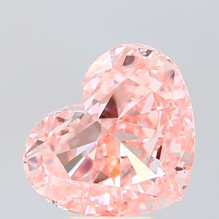 Loose Diamond - HEART 4.25ct Fancy Vivid Pink VS2: Loose Diamond - HEART 4.25ct Fancy Vivid Pink VS2 Source: This is a real non-mined Diamond that has been grown in a lab Shape: HEART Carats: 4.25 Color: Fancy Vivid Pink Certification: IGI Video: