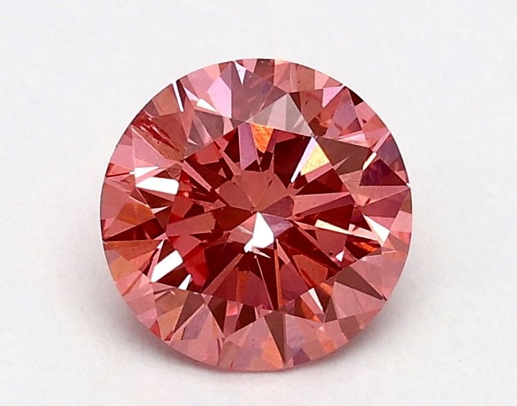 Loose Diamond - ROUND 0.61ct Fancy Vivid Pink SI1: Loose Diamond - ROUND 0.61ct Fancy Vivid Pink SI1 Source: This is a real non-mined Diamond that has been grown in a lab Shape: ROUND Carats: 0.61 Color: Fancy Vivid Pink Certification: IGI Video: