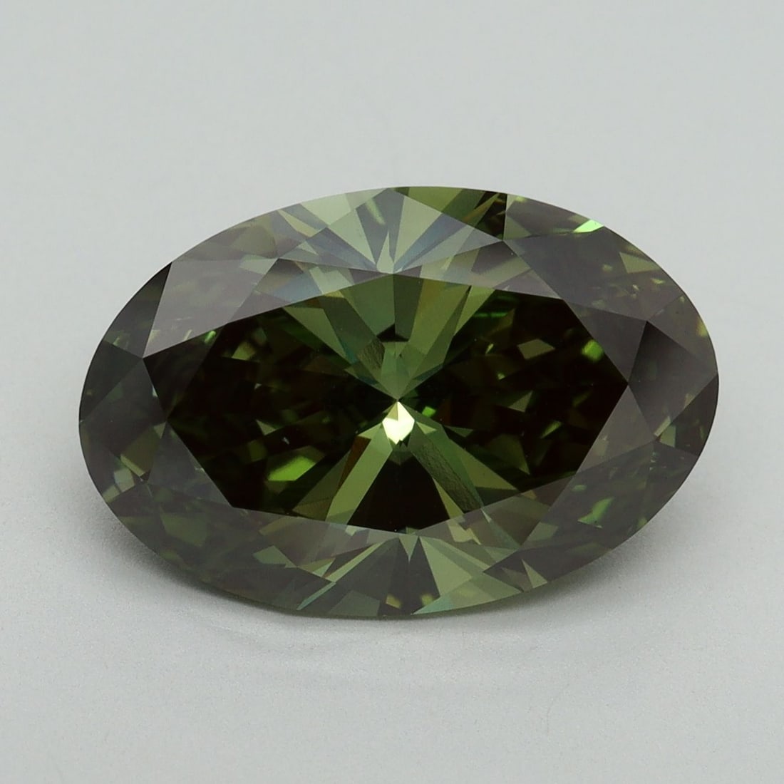 Loose Diamond - OVAL 5.07ct Fancy Vivid Green VS2: Loose Diamond - OVAL 5.07ct Fancy Vivid Green VS2 Source: This is a real non-mined Diamond that has been grown in a lab Shape: OVAL Carats: 5.07 Color: Fancy Vivid Green Certification: IGI Video: