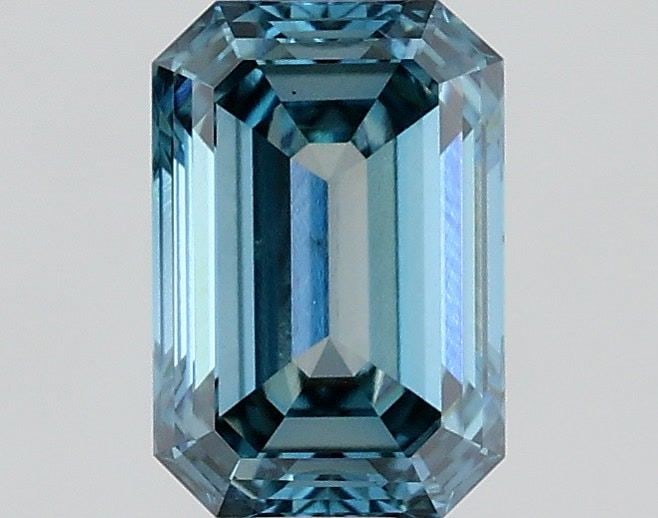 Loose Diamond - EMERALD 0.71ct Fancy Vivid Greenish Blue VS2: Loose Diamond - EMERALD 0.71ct Fancy Vivid Greenish Blue VS2 Source: This is a real non-mined Diamond that has been grown in a lab Shape: EMERALD Carats: 0.71 Color: Fancy Vivid Greenish Blue Certific